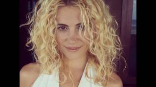 Newly engaged Pixie Lott cosies up to shirtless fiancé Oliver Cheshire during Jamaican getaway