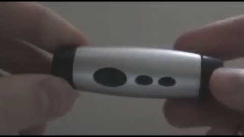 Mini LCD Flashlight-Style Digital Projection Keychain Clock from DealExtreme