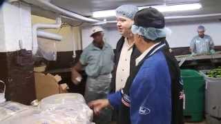 Deliman Ziggy Gruber of Kenny & Ziggy's gets a tour of United Pickle from Steve Leibowitz
