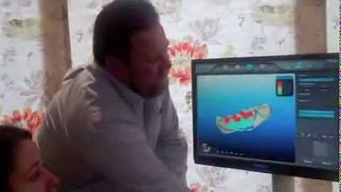 Dr Nick Fahey demonstrating the iTero scanner