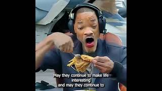 Will Smith eating spaghetti while flying a fighter jet with a puppy.