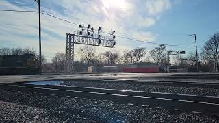 long CSX intermodal with mid 2 engine dpus crossing the Blue Island diamond