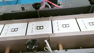 Boxes overwrapping machine automatic pushing type cellophane film overwrapper