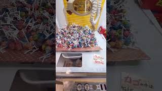 Takes out a lollipop from inside the machine #shortvideo