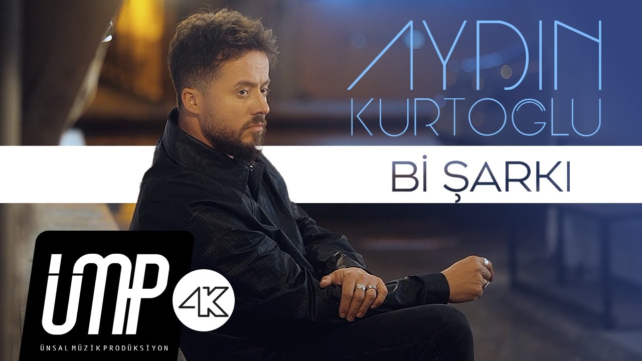 Aydın Kurtoğlu - Bi Şarkı (Official Video) adlı videoyu YouTube'da izle