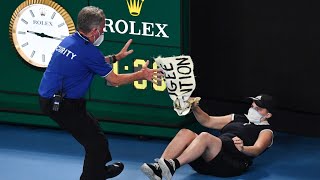 Australian Open 2022 Final: Intruder Jumps Down Onto the Court At RLA During Australian Open Final.
