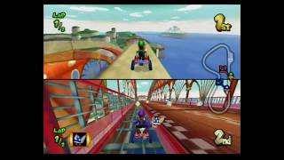 Mario Kart Double Dash blue shell glitch + skip track glitch
A blue shell glitch in Mushroom bridge, the player in 2nd place throws a blue shell at the player in 1st place while he is on top of the bridge, and the shell keeps turning around the track.
A glitch in Bowsers castle, get hit by a blue shell or a Bob-omb while youre at the edge of the ground, the Lakitu will respawn you on the balcony, thinking you fell off from it. Mario Kart Double Dash blue shell glitch + skip track glitch