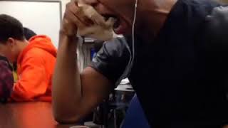 black guy crying over music