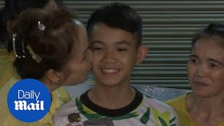 Heartwarming moment rescued Thai cave boy returns home to family