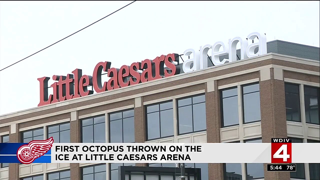 Joe Louis Arena building manager Al Sobotka swings the first