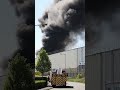 FIRE AT A RUBBER FACTORY NEXT TO TRAFFORD CENTRE IN MANCHESTER...
