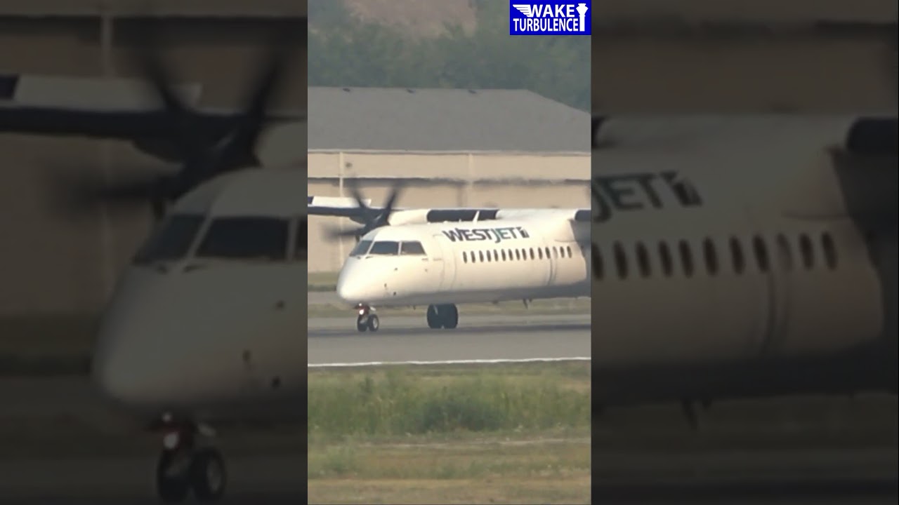 Dash 8 Q400 lands in Smoky Kelowna (WestJet Encore from Calgary)