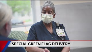 IMS honors health care heroes with green flag delivery