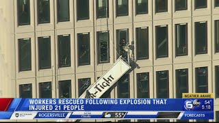 Baltimore building explosion injures 23, traps workers