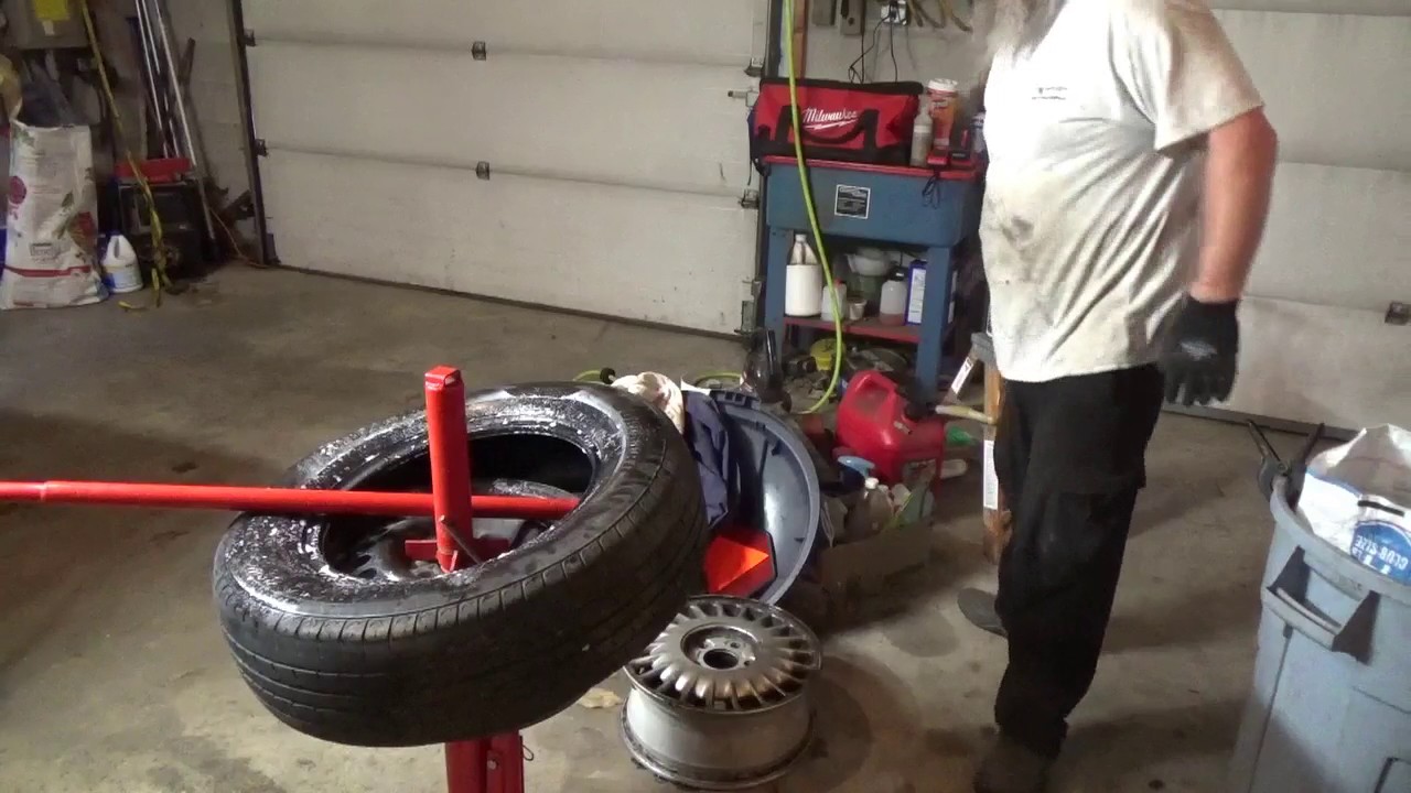 Manual tire changer. Manual tire changer. Video 3 