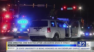 1 arrested, 1 wanted after carjacking ends in wreck in Jackson