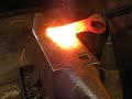 Blacksmith welding axe`s blade