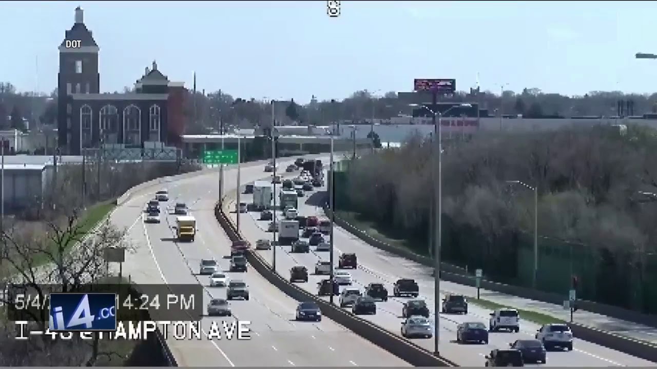 Truck crashes into light pole on I-43 - YouTube