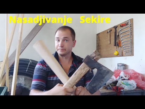 Video: Kako Posaditi Sjekiru Na Sjekiru