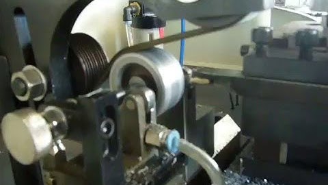 Rotor commutator surface turning machine