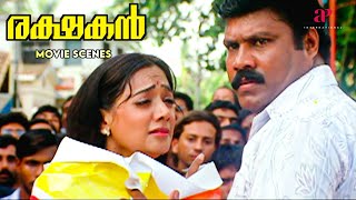 Rakshakan Malayalam Movie | Kalabhavan Mani saves Manya from a perilous situation | Kalabhavan Mani