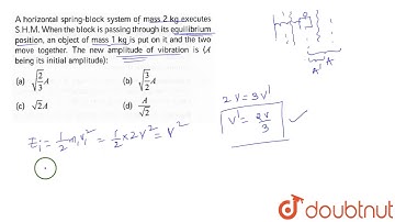 A horizontal spring -block system of mass `2kg` executes `S.H.M` when the block is passing through