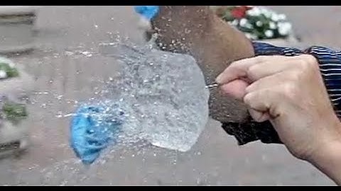 The Physics of Popping Water Balloons