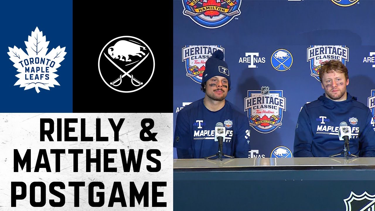 Toronto Maple Leafs players line up for the Canadian national anthem before  playing against the Buffalo Sabres in the NHL Heritage Classic hockey game  in Hamilton, Ontario, on Sunday, March 13, 2022. (