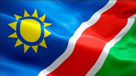 Namibian flag video waving in wind. Realistic Windhoek Flag background. Namibia flag Full H