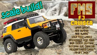 FMS 1/18 FJ Cruiser RC rock crawler scale build - Warn winch, ARB bumper, ARB awning, and KO2 tires.