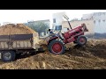 Mahindra 265 stuck in soil with trolly