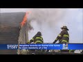 Firefighters battle 3alarm house fire in somerville