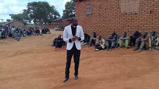 Rev Alexander Kambiri preaching at the funeral service in Malomo Ntchisi