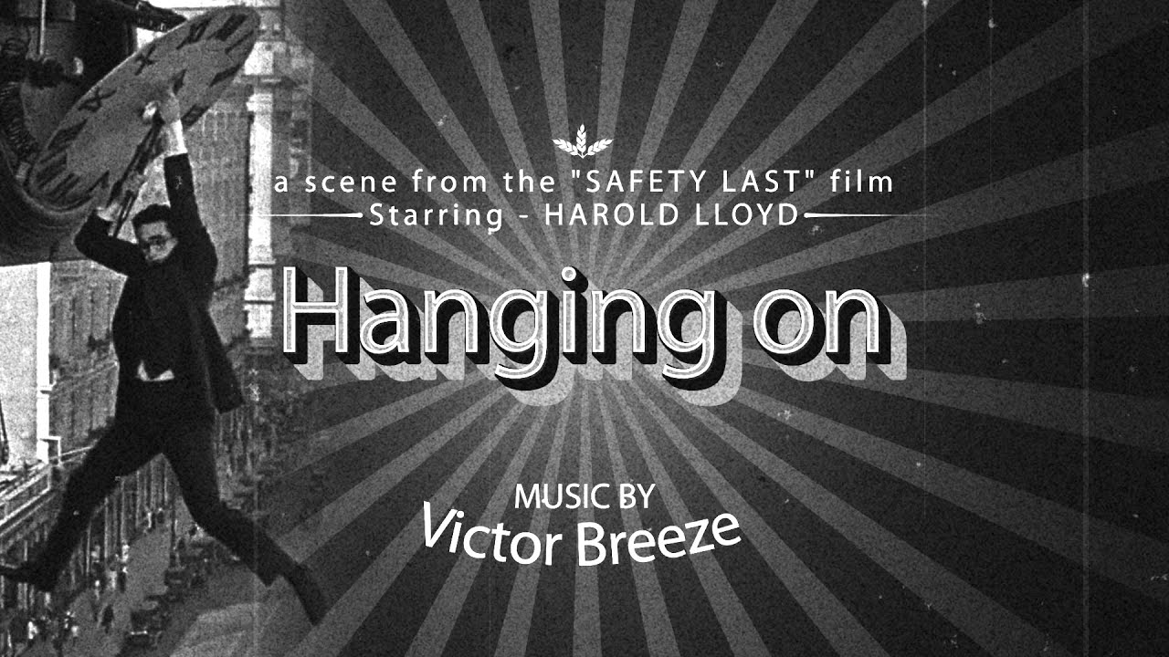 ️HANGING ON a scene from the "Safety Last" film (1923) by Harold