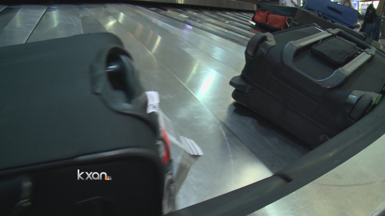 Woman caught stealing luggage from baggage claim at ABIA YouTube