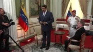 ONLY ON AP: Maduro blames US sanctions for crisis