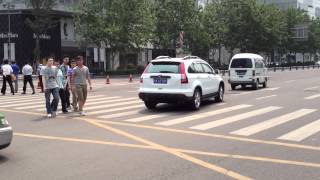 Walking Across The Street In Chengdu