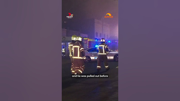 Man dies after being pulled from burning building