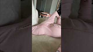 Precious Girl Naps in Yoga Pose While Holding Bottle