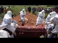 Burials of Ebola victims continue in eastern Congo under armed escort after community resistance