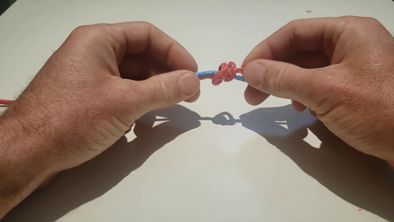 Привязывание слабого звена для буксировки дельтапланов