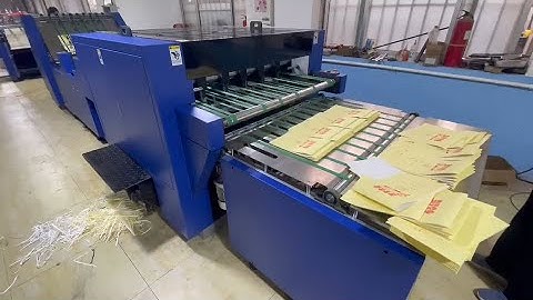 EXERCISE BOOKS&NOTE BOOKS FULL AUTOMATIC PRODUCTION LINE-COLLATING,STAPLING,FOLDING,WASTING,CUTTING.