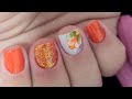 Unha Decorada, Esmalte Laranja, Glitter e Adesivo com Flor