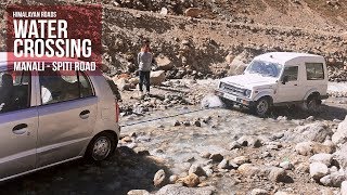 Towing a Small Car from a Dangerous Water Crossing