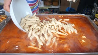 Koreanischer populärer Snack-würziger Reiskuchen, Tteokbokki - Koreanisches Straße Essen