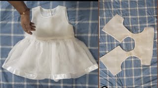 Simple frock cutting and stitching.