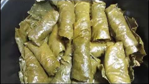 DOLMADES- Homemade stuffed grape leaves