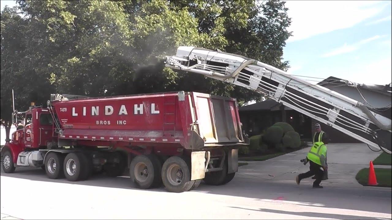 Asphalt Saw, Skid Steer, Road Milling Machine, Street Sweeper, and Dump Trucks Street Repairs