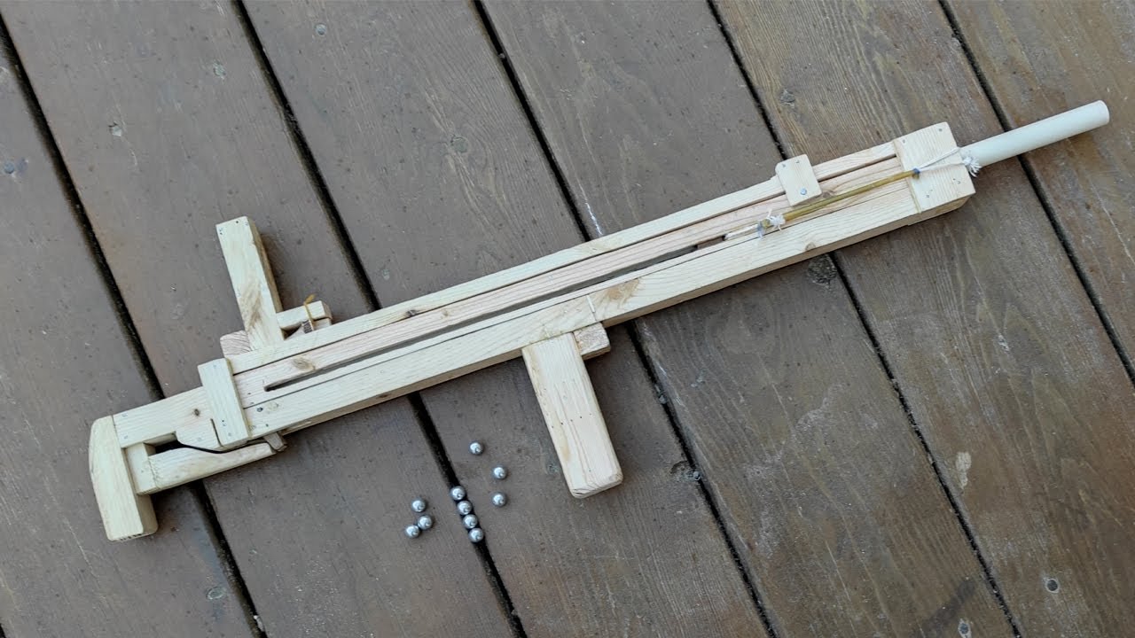How to make powerful automatic slingshot gun out of wood | slingshot gun diy