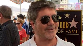 Simon Cowell Supported by AGT Judges and Kelly Clarkson at Walk of Fame Ceremony